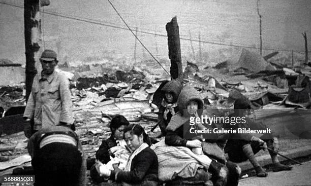 Tokyo residents who lost their homes as a result of the U.S. Bombings. 10th March 1945. The Operation Meetinghouse air raid of 9-10 March 1945 was...