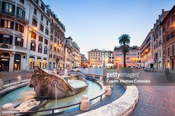 piazza di spagna illuminated at dusk, rome, italy - cobblestone stock pictures, royalty-free photos & images