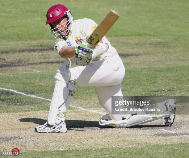 Clinton Perren of the Bulls in action during day two of the Pura Cup match between the Queensland Bulls and the South Australian Redbacks at the...