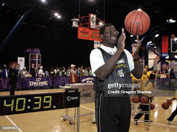 Joseph Odhiambo goes for the Guinness World Record for spinning a basketball, over four hours, at the Spalding Neverflat court at Jam Session during...