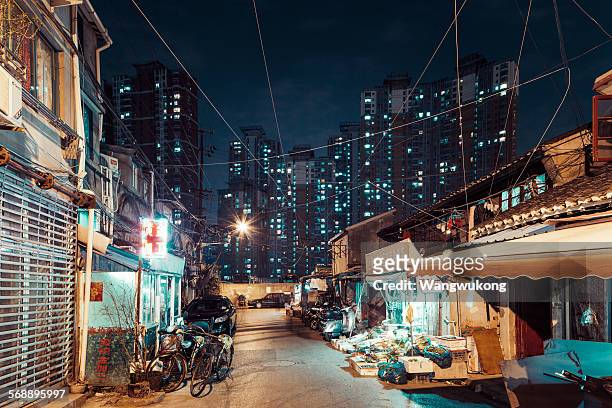 tall and low residential building - slum stock pictures, royalty-free photos & images
