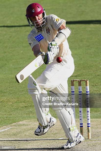 Clinton Perren of the Bulls in action during day two of the Pura Cup match between the Queensland Bulls and the South Australian Redbacks at the...