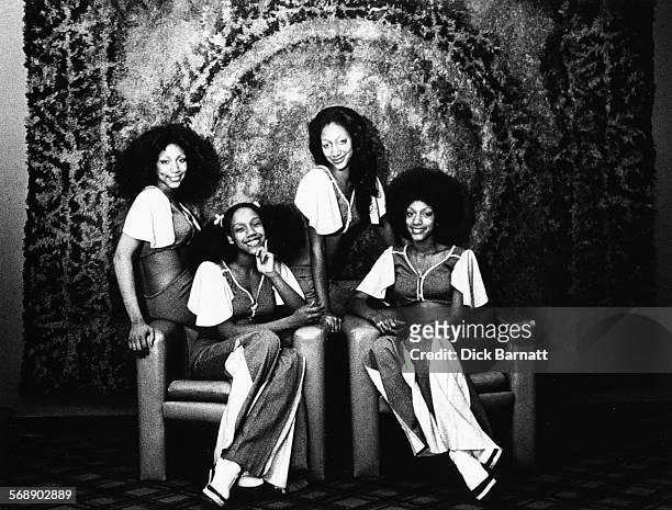 Portrait of music group 'Sister Sledge' wearing matching outfits, circa 1977.