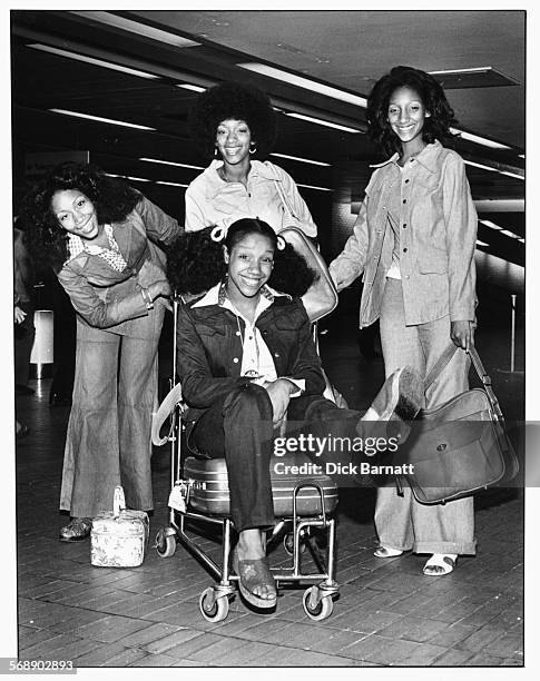 Portrait of music group 'Sister Sledge' at the airport, circa 1977.