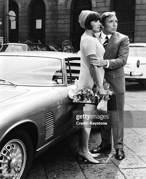 Portrait of Italian actors Ugo Tognazzi and Maria Grazia Buccella in a scene from the film 'Sissignore', Milan, April 1968.
