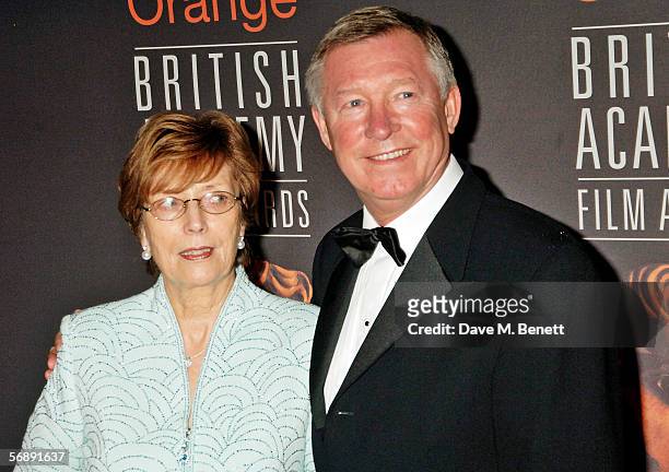Manchester United manager Sir Alex Ferguson and his wife Cathy Ferguson arrive at The Orange British Academy Film Awards at the Odeon Leicester...