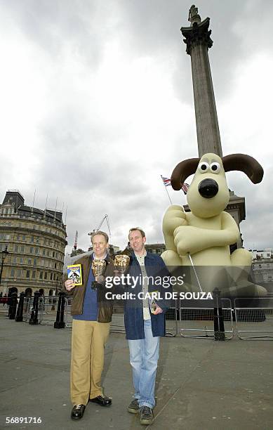 United Kingdom: Animator Nick Park and Producer Steve Box pose for photographs at Trafalgar Square in London, 20 February 2006, as they mark the sale...