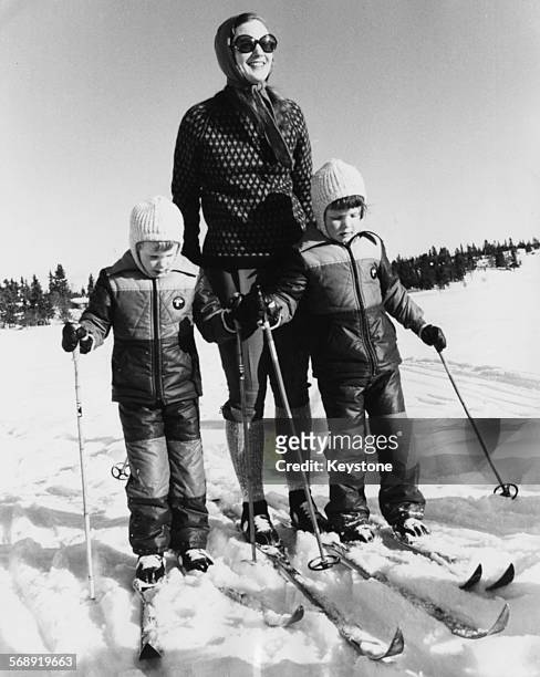Queen Margrethe of Denmark with her sons, Prince Frederik and Prince Joachim, on the slopes enjoying a skiing holiday in Norway, February 26th 1975.