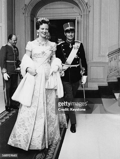 Queen Margrethe and Prince Henrik of Denmark attending a gala dinner for the Diplomatic Corps at Amalianberg Castle, Denmark, March 15th 1973.