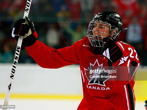 Hayley Wickenheiser of Canada celebrates teammate Gillian Apps' first period goal to make the score 1-0 over Sweden during the final of the women's...