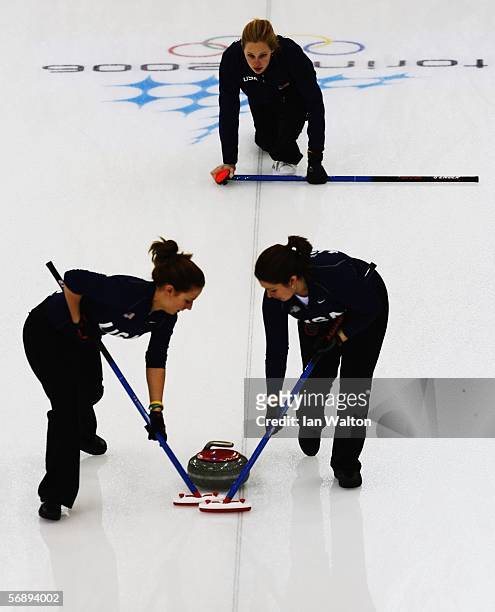 Cassie Johnson of the United States releases the stone during the preliminary round of the women's curling between USA v Great Britain during Day 10...