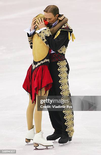 Tatiana Navka and Roman Kostomarov of Russia embrace at the end of their performance during the Free Dance program of the figure skating during Day...