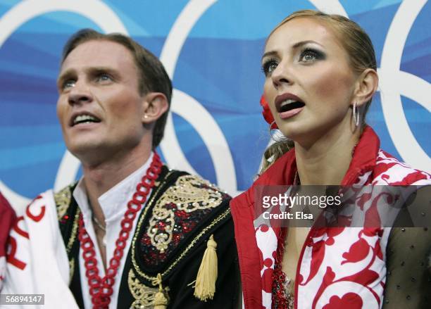 Tatiana Navka and Roman Kostomarov of Russia at the end of their performance awaiting the judges scores during the Free Dance program of the figure...