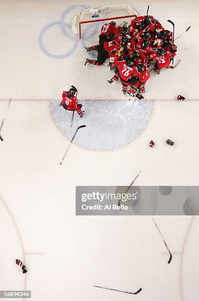 Team Canada celebrates their 4-1 victory over Sweden to win the gold medal in women's ice hockey during Day 10 of the Turin 2006 Winter Olympic Games...