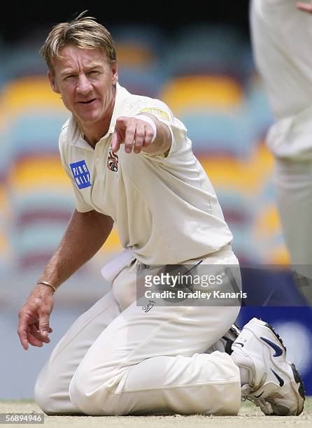 Andy Bichel of the Bulls points to the batsmen during day three of the Pura Cup match between the Queensland Bulls and the South Australian Redbacks...