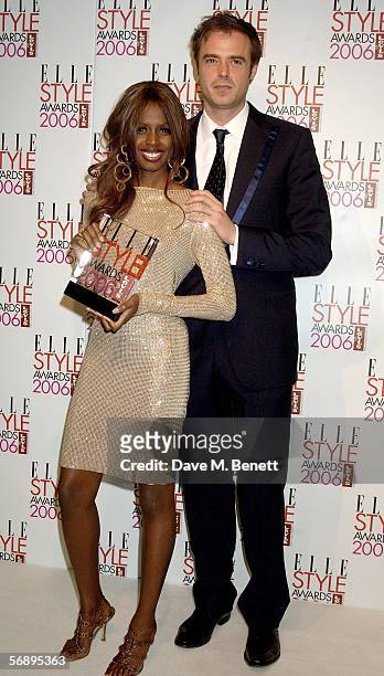 Presenter June Sarpong poses backstage in the Awards Room with the Levi's Hot Look award presented by Jamie Theakston at the ELLE Style Awards 2006,...