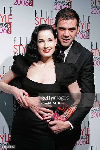 Dita Von Teese poses backstage with Roland Mouret, winner of the International Designer Award, at the ELLE Style Awards 2006, the fashion magazine's...
