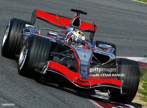 McLaren Formula One driver Juan Pablo Montoya of Colombia takes a curve in his new MP4-21 car during a training session at the Catalonia racetrack in...