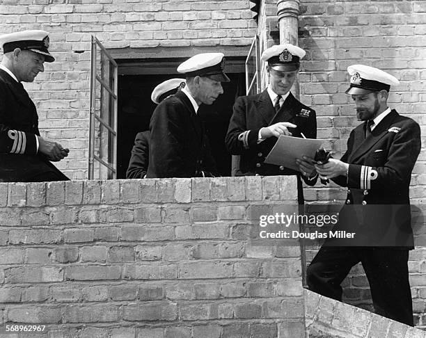 Lieutenant Philip Mountbatten, prior to his marriage to Princess Elizabeth, talking to a group of Naval officers on his return to Royal Navy duties,...