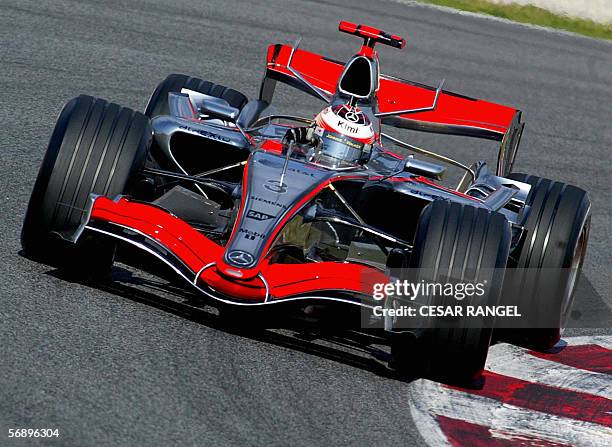 McLaren Formula One driver Kimi Raikonen of Finland takes a curve in his new car MP4-21 during a training session at the Catalonia racetrack in...