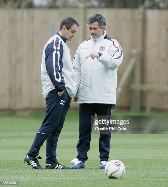 Jose Mourinho Manager of Chelsea talks with Steve Clarke during training for the UEFA Champions League match against Barcelona at their training...