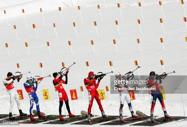 Competitors shoot in the Mens Biathlon 4x7.5km Relay Final on Day 11 of the 2006 Turin Winter Olympic Games on February 21, 2006 in Cesana San...