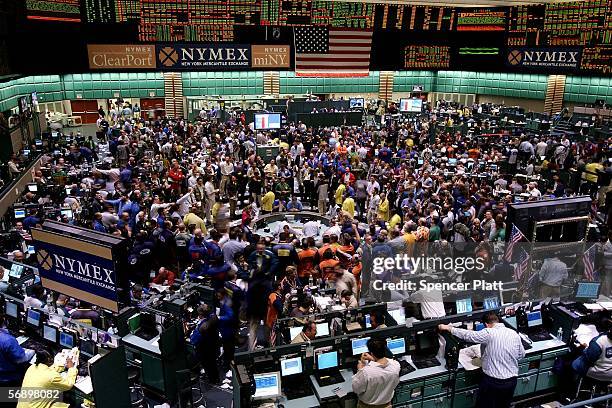 Traders work the floor of the New York Mercantile Exchange February 21, 2006 in New York City. As supply concerns in the futures markets spilled over...