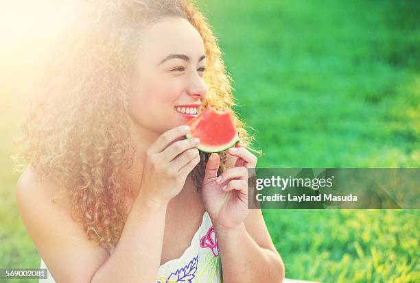 summer - teen girl eating watermelon - saturated color stock pictures, royalty-free photos & images