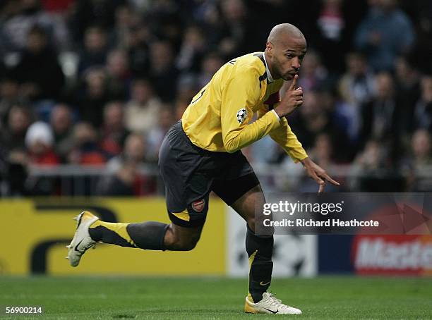 Thierry Henry celebrates scoring the first goal for Arsenal during the UEFA Champions League Round of 16, First Leg match between Real Madrid and...