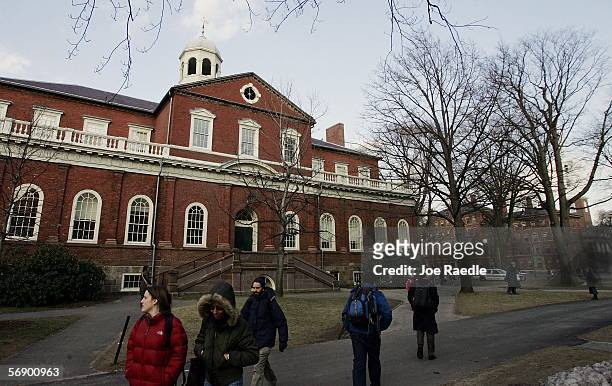 Harvard University students walk through the campus on the day Harvard University president, Lawrence H. Summers announced he is resigning at the end...