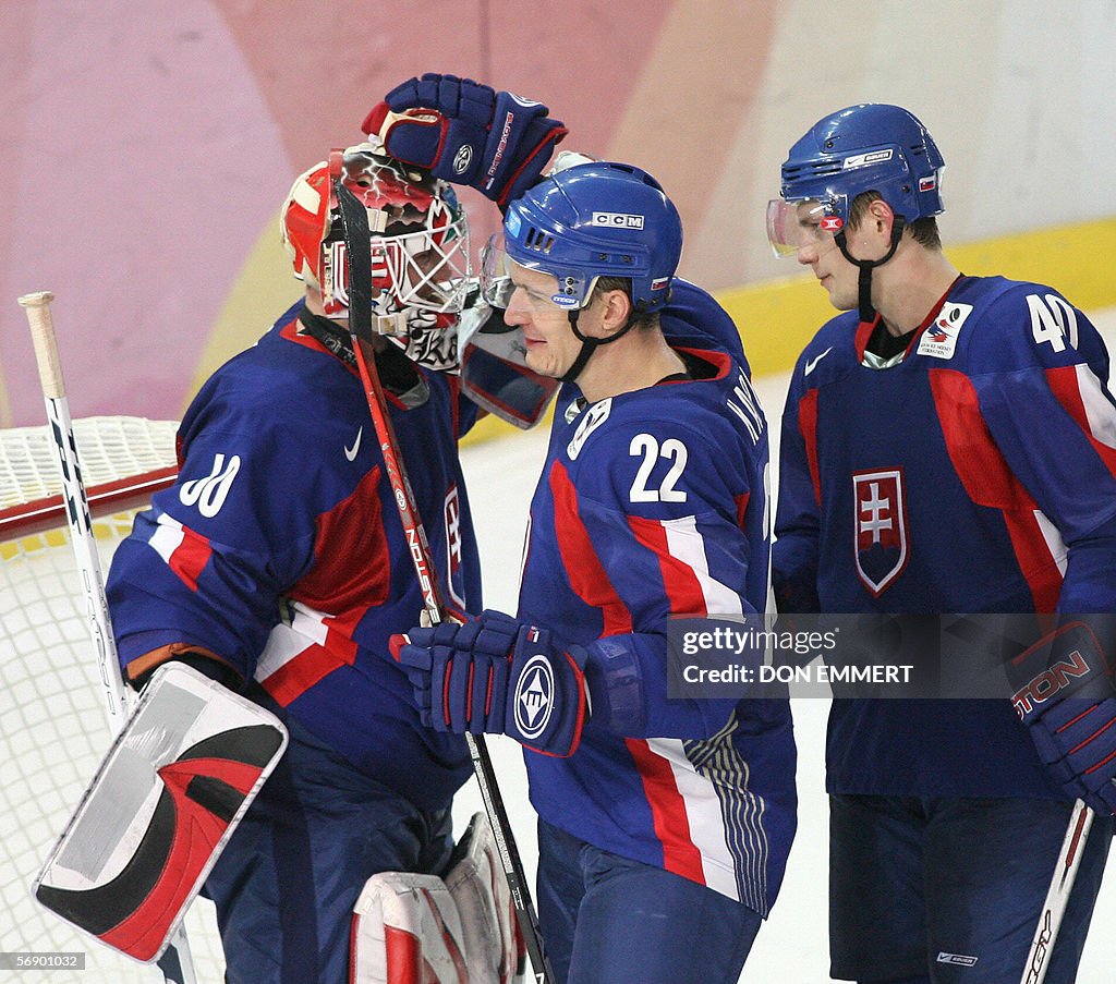 Slovakia's Per Johan Axelsson (C) and He