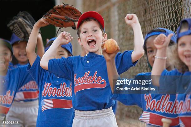 little league team cheering - girl baseball cap stock pictures, royalty-free photos & images