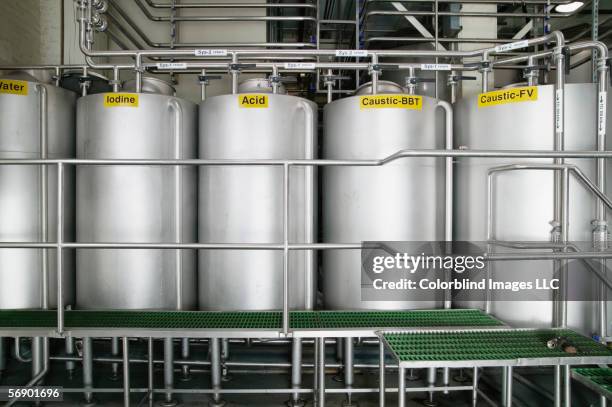 storage tanks in warehouse - vat foto e immagini stock