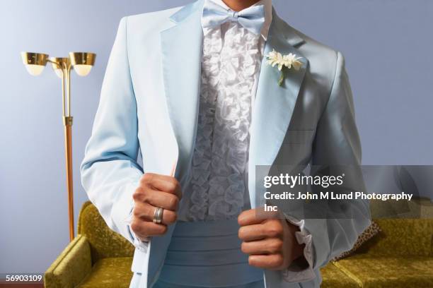 torso view of young man in tuxedo - ruffled tuxedo stock pictures, royalty-free photos & images