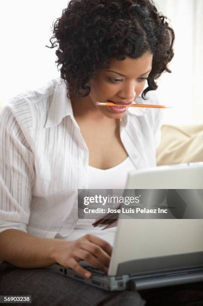 Lady Biting Computer Women Biting Laptops Photos and Premium High Res Pictures - Getty Images