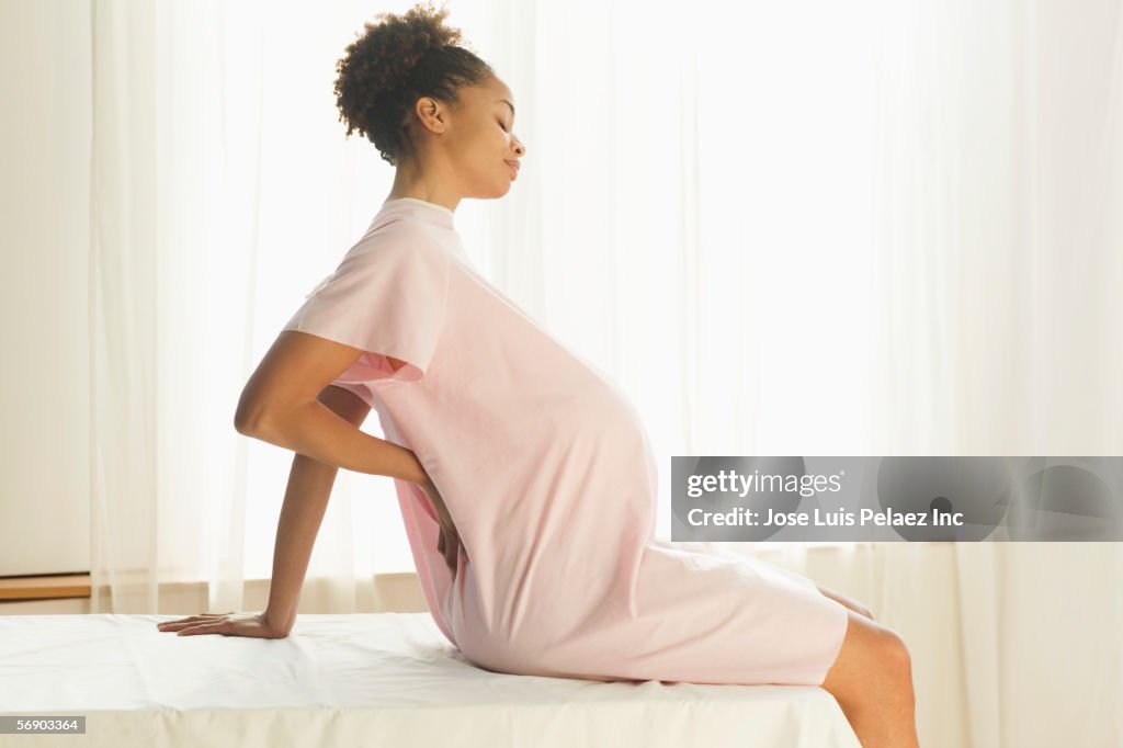 Pregnant woman waiting for her doctor