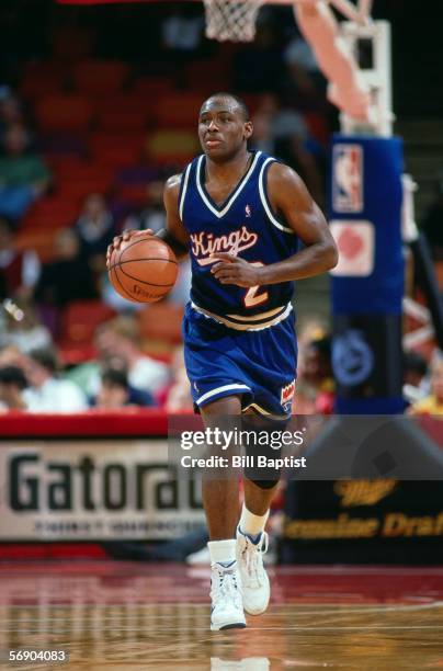 Mitch Richmond of the Sacramento Kings brings ball upcourt against the Houston Rockets during an NBA game at the Summit circa 1993 in Houston, Texas....