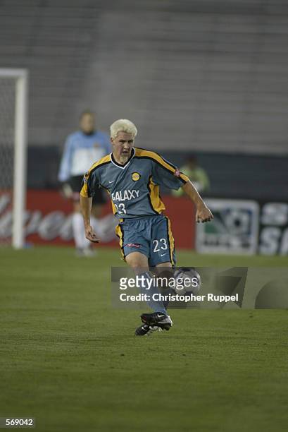Defender Danny Califf of the Los Angeles Galaxy moves the ball forward against the Dallas Burn during the first half at the Rose Bowl in Pasadena,...
