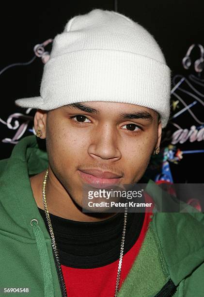 Singer Chris Brown poses backstage during the 4th Annual TRL Awards at the MTV Times Square Studios February 21, 2006 in New York City.