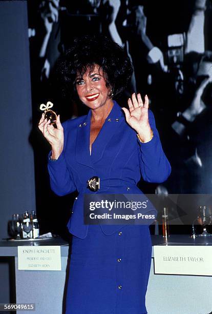 Elizabeth Taylor unveils her fragrance 'White Diamonds' circa 1991 in New York City.