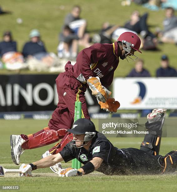 Brendon McCullum of New Zealand is run out for 45 by Danesh Ramdin during the second one day international cricket match between New Zealand and the...