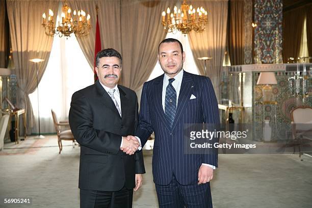 Israeli Labor Party Chairman and candidate for prime minister Amir Peretz poses for a picture with his host Moroccan King Mohammed VI February 17,...