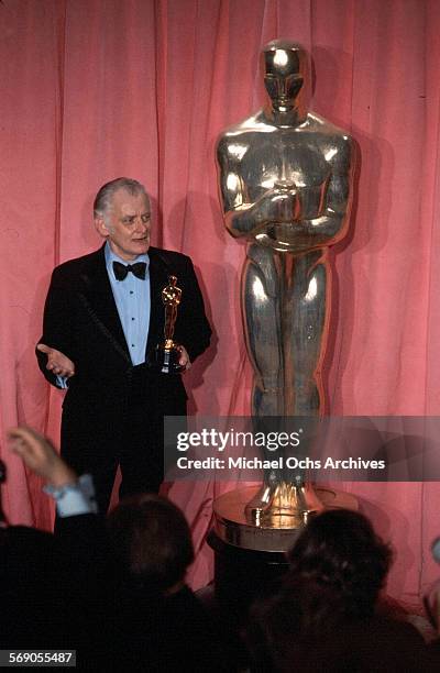 Actor Art Carney poses backstage after winning "Best Actor" award during the 47th Academy Awards at Dorothy Chandler Pavilion in Los...