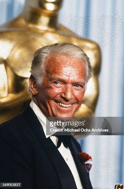 Actor Douglas Fairbanks Jr.poses backstage during the 52nd Academy Awards at Dorothy Chandler Pavilion in Los Angeles,California.