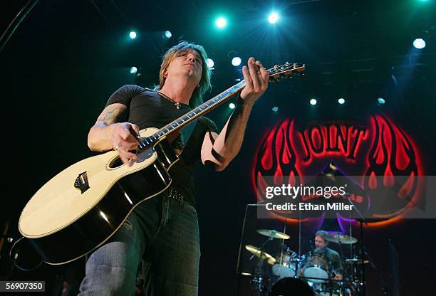 Goo Goo Dolls singer/guitarist Johnny Rzeznik and drummer Mike Malinin perform during the MAGIC convention's opening night party at The Joint inside...