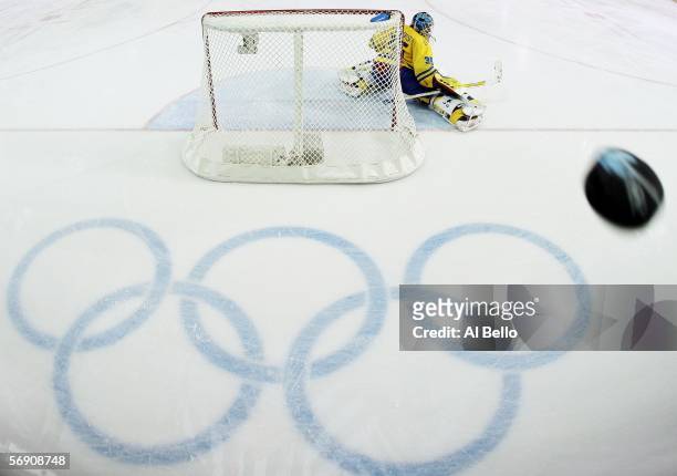 Henrik Lundqvist of Sweden watches the puck fly by during the quarter final of the men's ice hockey match between Sweden and Switzerland during Day...