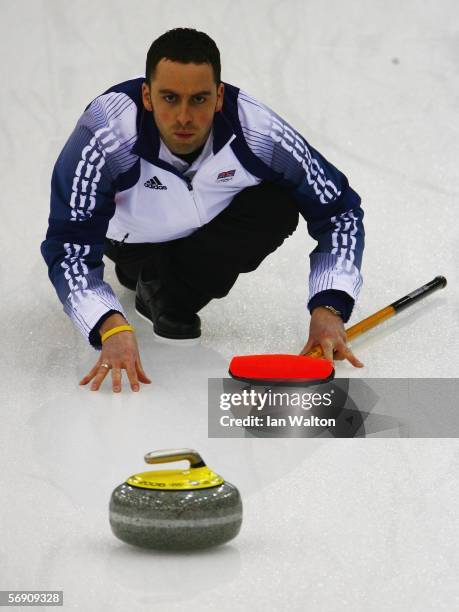 David Murdoch of Great Britain follows her throw during the semi-final of the Men's curling between Finland and Great Britain during Day 12 of the...