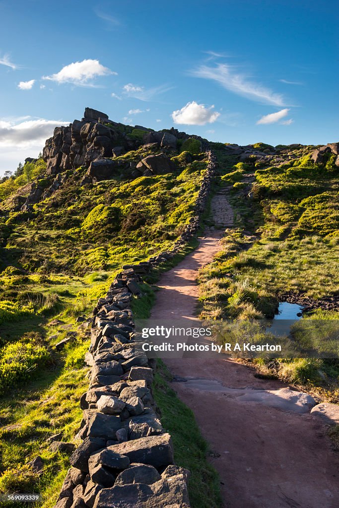 Footpath and stone wall on The Roaches, England