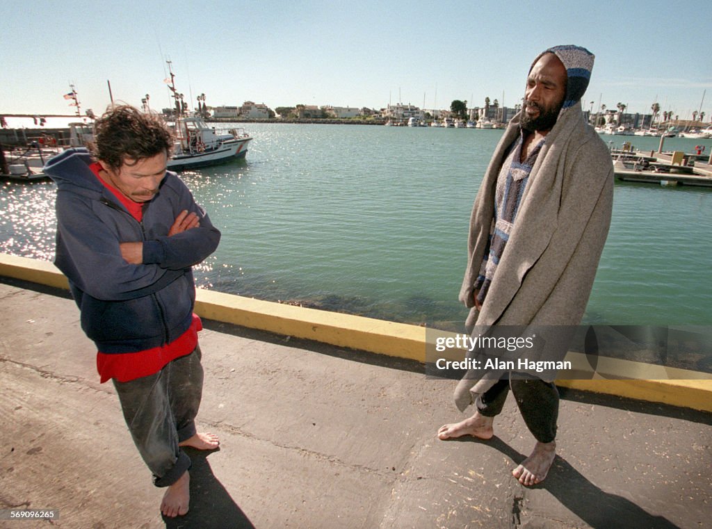 Hao Huynh, left, 42, and Howard Gerald, right, 38, talk about their rescue after the fishing boat th