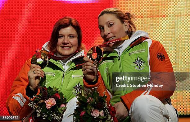 Sandra Kiriasis and Anja Schneiderheinze of Germany receive the Gold medal in the Two Woman Bobsleigh at the Medals Plaza on Day 11 of the 2006 Turin...